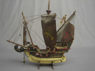 A wooden model of a 3 masted galleon 16"