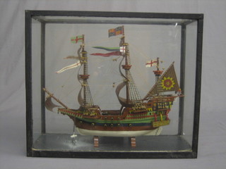 A wooden model of a Seamaster's galley contained in a display cabinet
