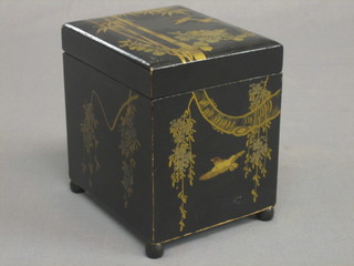 A 1930's Oriental black lacquered musical cigarette box with hinged lid, the lid decorated birds amidst branches