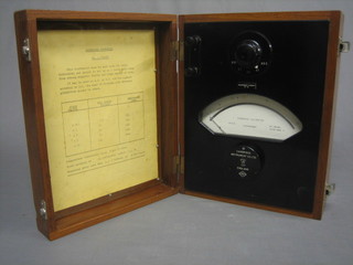 A Cambridge voltmeter contained in a wooden case