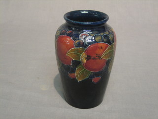 A Moorcroft pomegranate pattern vase, the base with signature mark and marked Made in England 6"