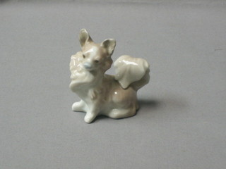 A Lladro figure of a small dog, the base marked O-29 3"