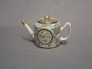A 19th Century famille vert porcelain teapot with strap work handle, spout with old repair