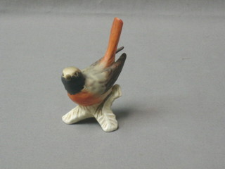 A Goebal figure of a seated bird, the base marked 3306-10 4"