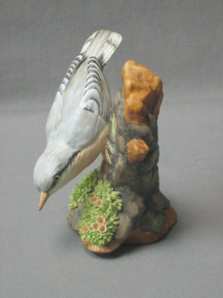 A Royal Staffordshire figure of a Nuthatch no. 276 modelled by J Bromley (slight hair crack to base) 5"