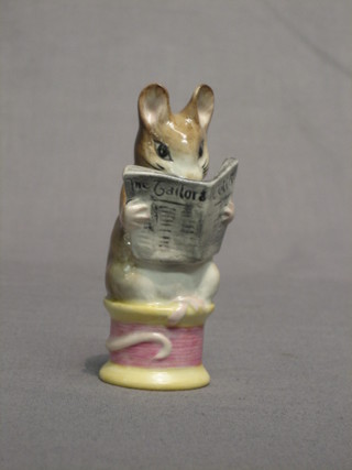 A Beswick Beatrix Potter figure The Tailor of Gloucester, the base with gold back stamp and marked F Waren & Co Ltd