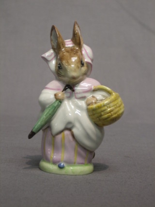 A Beswick Beatrix Potter figure Mrs Rabbit, the base with gold back stamp