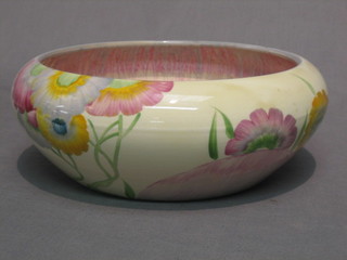 A circular Clarice Cliff pottery bowl with floral decoration, the base with black Clarice Cliff mark, 8"