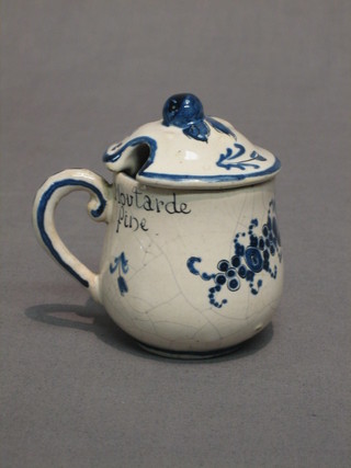 An 18th Century style blue and white Delft style mustard pot, marked Dijon 1717