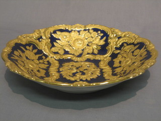 A Meissen style blue and gilt pattern porcelain bowl, the base with cross swords and impressed 798 12"