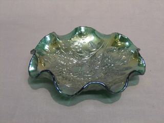 A green Carnival glass bowl with wavy border marked Good Luck and decorated a horse shoe 9"