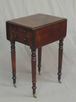 A Victorian mahogany drop flap work table, fitted 2 drawers and raised on turned supports 19"