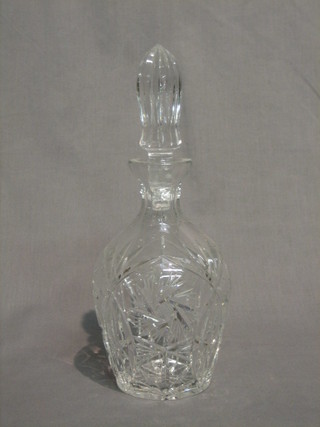 A cut glass mallet shaped decanter and stopper 11"