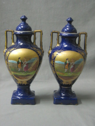 A pair of Edwardian pottery twin handled vases decorated a farmer and lady 12"