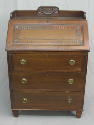 An Edwardian carved walnut bureau, the top with three-quarter gallery the fall front revealing a well fitted interior above 3 long drawers, raised on bracket feet 30"