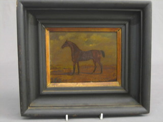 An 18th/19th Century oil on board "Standing Horse in a Country Landscape with Spire in the Distance" 5 1/2" x 6 1/2"