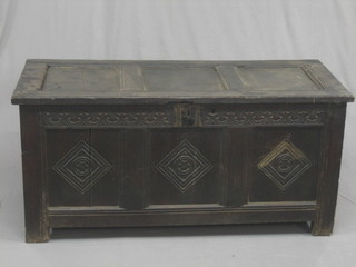 An 18th Century oak coffer of panelled construction 50"
