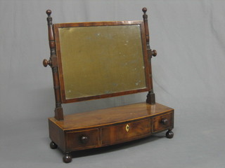 A 19th Century rectangular plate dressing table mirror, raised on a stand with bow front base, fitted 1 long and 2 short drawers, raised on bun feet 20"
