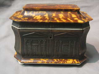 A handsome Victorian tortoiseshell and ivory twin compartment tea caddy, of lozenge form with hinged lid, the body carved classical buildings, raised on 4 bun feet (some damage to top right hand and to hinges) 8"