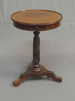 A mahogany wine table, raised on a carved bedpost column with triform base 19"