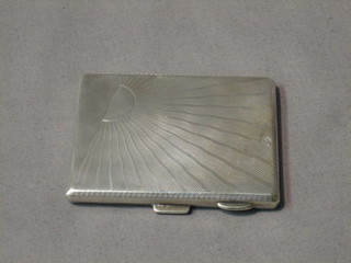 An Art Deco silver compact with sunray decoration, Birmingham 1930, 2"
