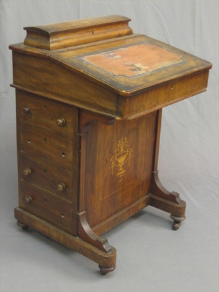 A Victorian inlaid figured walnut Davenport desk with stationery box to the top and hinged lid, the pedestal fitted 4 long drawers 20" (requires some attention)