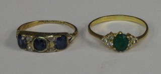 A lady's 18ct gold dress ring set blue and white stones another set green and white stones