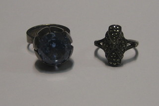 A silver marcasite ring and 1 other