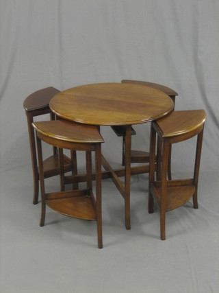 An Art Deco 1930's circular nest of 5 interfitting coffee tables 24"