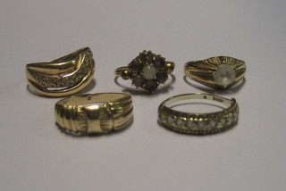 A gold dress ring set pink and white stones, do. set pink stone and 3 gilt metal dress rings