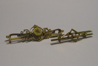 A 9ct gold bar brooch set a pearl and 1 other