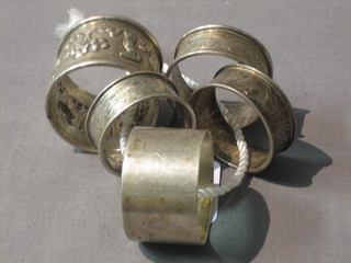 3 silver napkin rings and an Eastern silver napkin ring