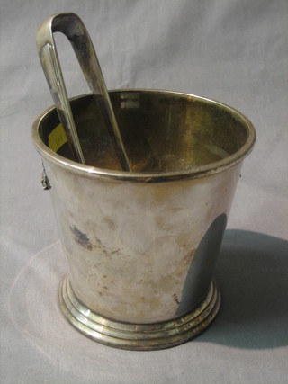 An Art Deco silver plated twin handled ice pail and tongs