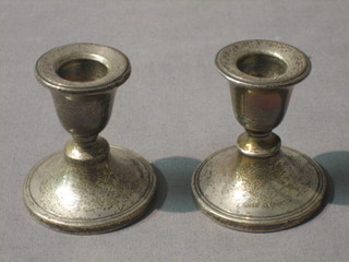 A pair of circular silver stub candlesticks, Birmingham 1920 2"