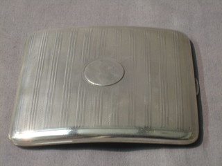 A silver cigarette case with engine turned decoration Chester 1912, 4 ozs