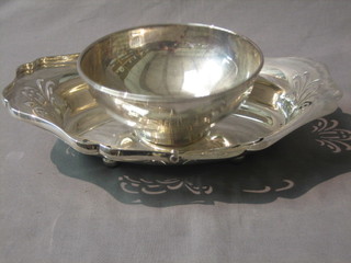 A circular silver plated bowl marked Benson 6" and an oval cake basket 10"