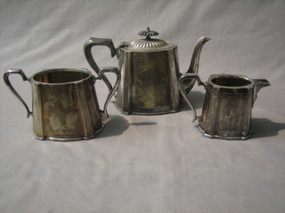 A Victorian engraved Britannia metal 3 piece tea service of oval form comprising teapot, twin handled sugar bowl and cream jug