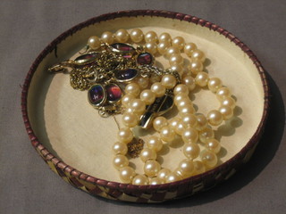 A string of simulated pearls, an amethyst coloured bracelet  and 2 gilt chains