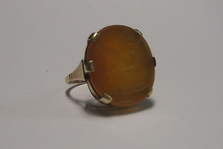 An Intaglio cut seal ring on a gold shank