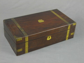 A 19th Century mahogany and brass banded writing slope with hinged lid 18" (brass rising in places)