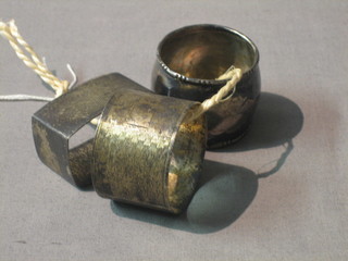 2 silver napkin rings and 1 other