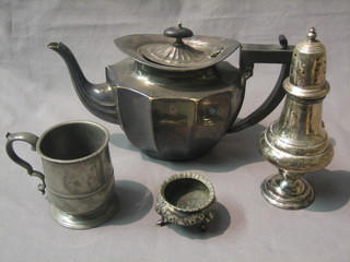 A silver plated teapot with hinged lid, a silver plated sugar castor, do. salt and a pewter tankard