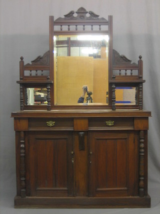 A Victorian walnut chiffonier with raised triple plate mirrored back, the base fitted 2 drawers above a double cupboard enclosed by panelled doors, raised on a platform base 47"
