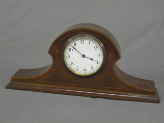 An Edwardian Swiss 8 day bedroom timepiece with enamelled dial and Arabic numerals, contained in an inlaid mahogany arch shaped case