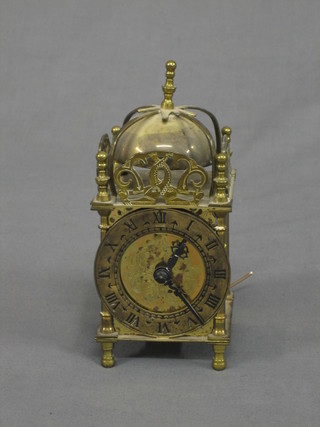 A Smiths reproduction brass lantern clock converted to electricity 3"