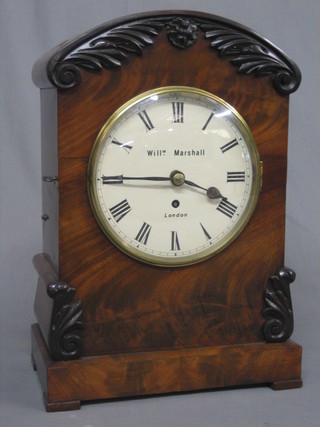 A William IV fusee bracket clock, the 7" dial with Roman numerals marked William Marshall of London, contained in an arched carved mahogany case