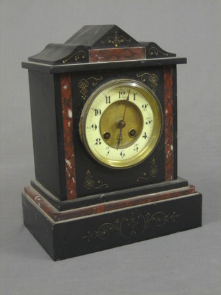 A Victorian French 8 day striking mantel clock contained in a 2 colour marble architectural case