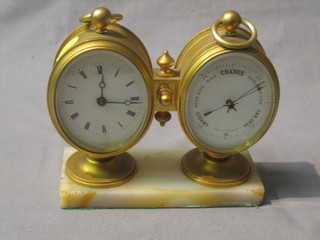 A 19th Century French table clock incorporating a barometer and clock, contained in a gilt metal case and raised on a marble base