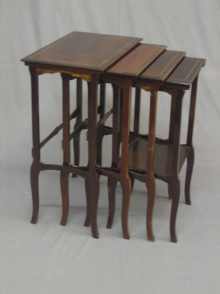 An Edwardian quartetto of inlaid mahogany interfitting coffee tables 16" 