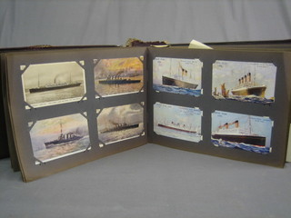 A leather album containing a collection of  postcards including British Empire Exhibition, Merchant Ships etc etc